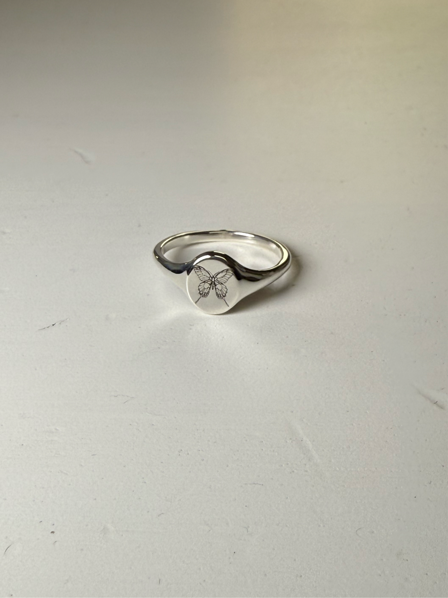 Mini silver signet ring with Butterfly engraving