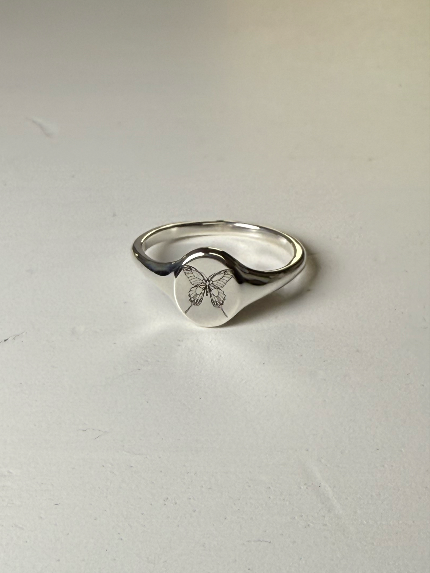 Mini silver signet ring with Butterfly engraving