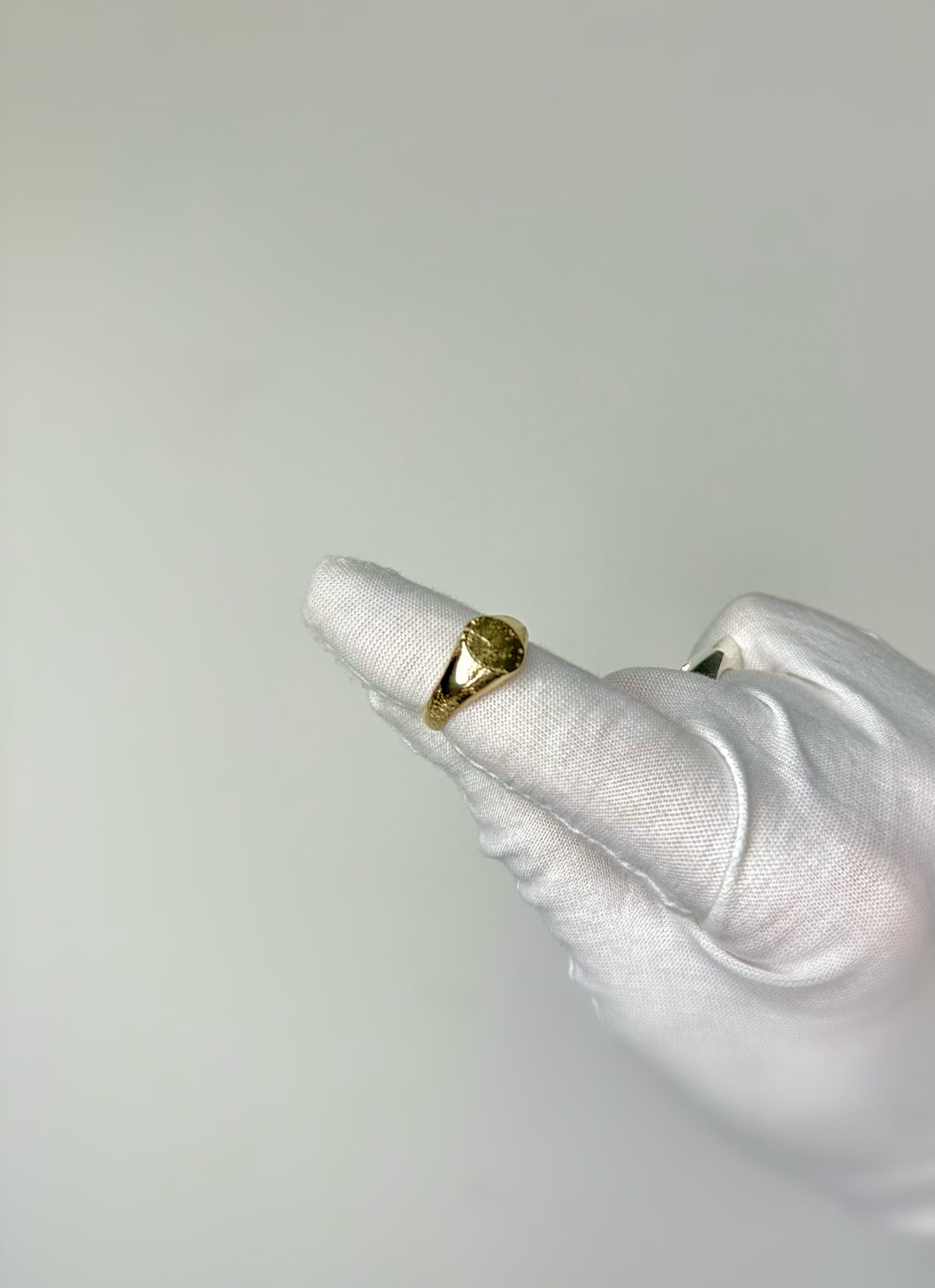 ‘Concrete’ textured signet ring in 9ct yellow gold